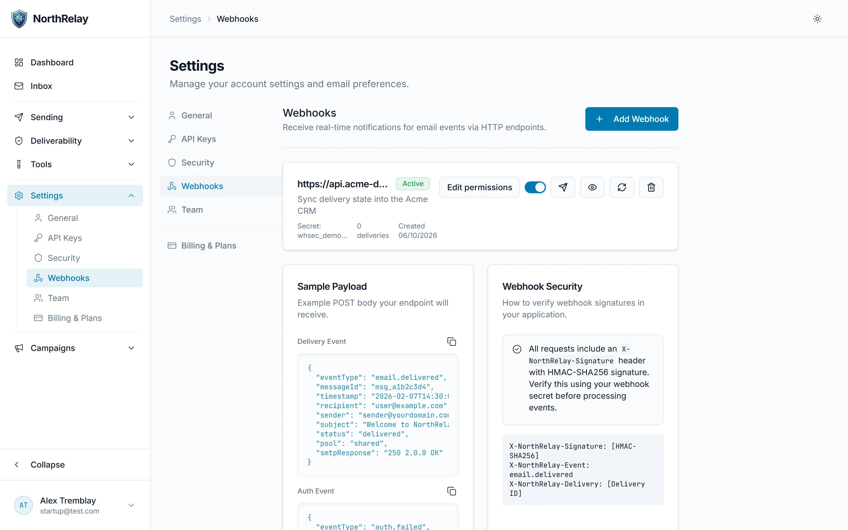 Webhooks settings page with an active endpoint, a sample delivery payload and the HMAC signature documentation